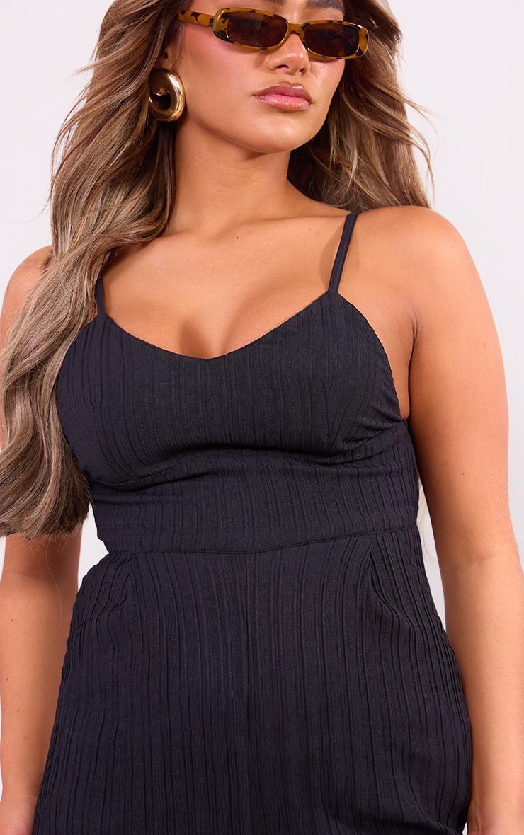 Black Strappy Textured Jumpsuit Product Image