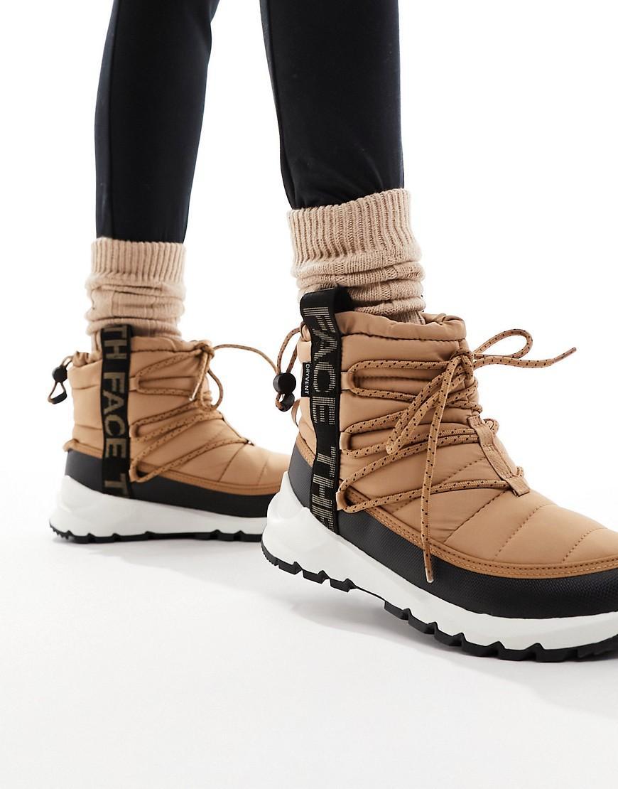 The North Face Women's ThermoBall Lace Up Waterproof Boot Almond Butter / TNF Black Product Image