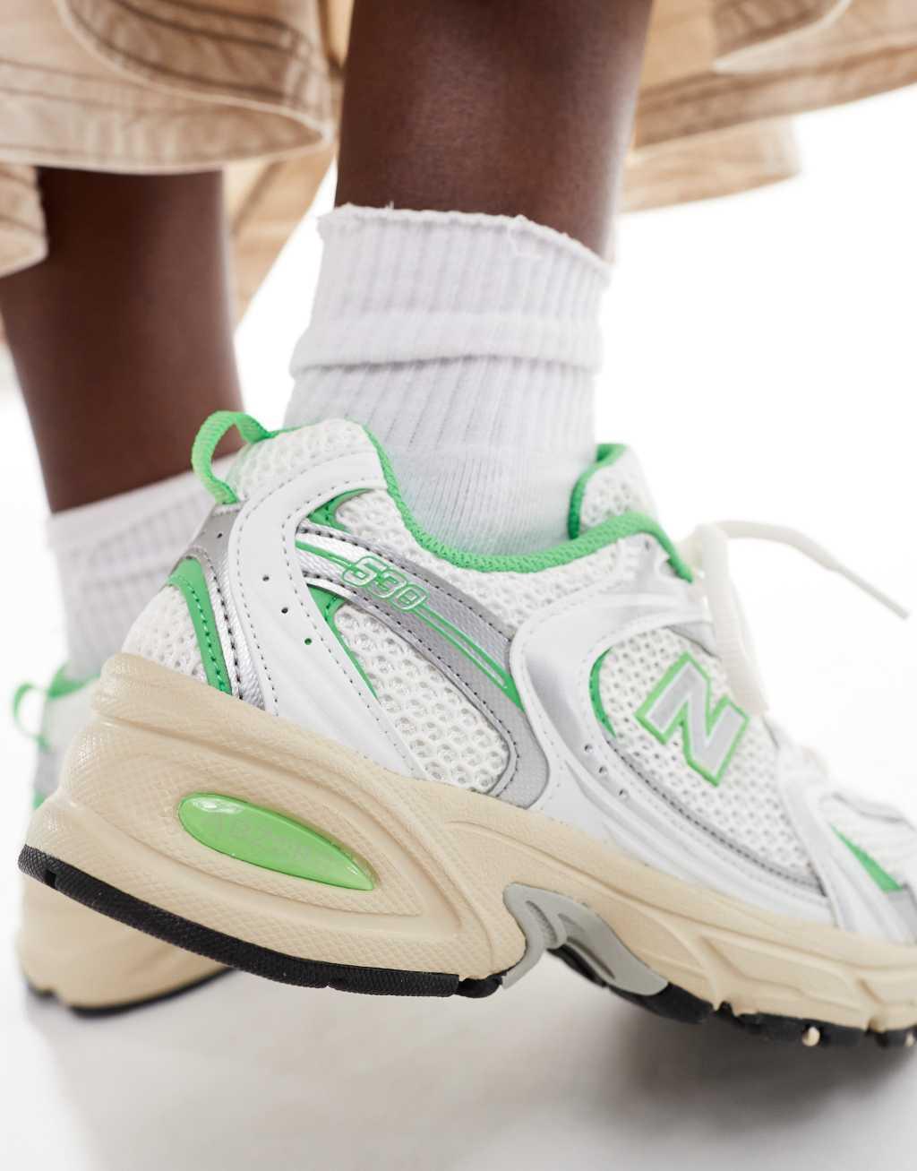 New Balance 530 sneakers in white and green  Product Image