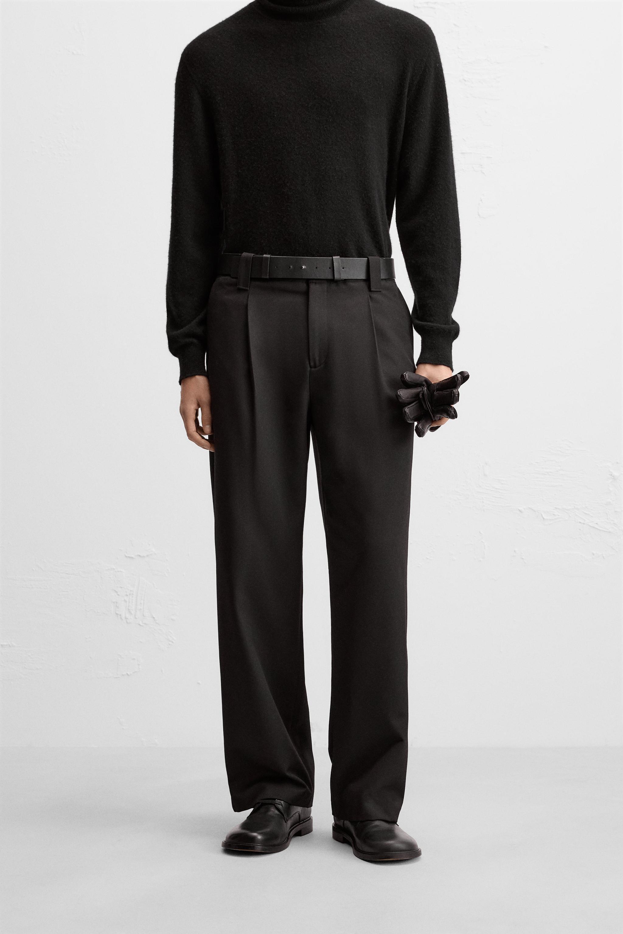 PLEATED PANTS WITH BELT Product Image