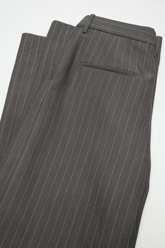 Deconstructed pinstripe trousers Product Image