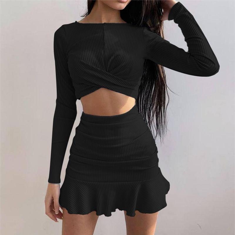 Set: Long-Sleeve Round Neck Plain Ribbed Crop Tee + High Rise Ruched Mini A-Line Skirt Product Image