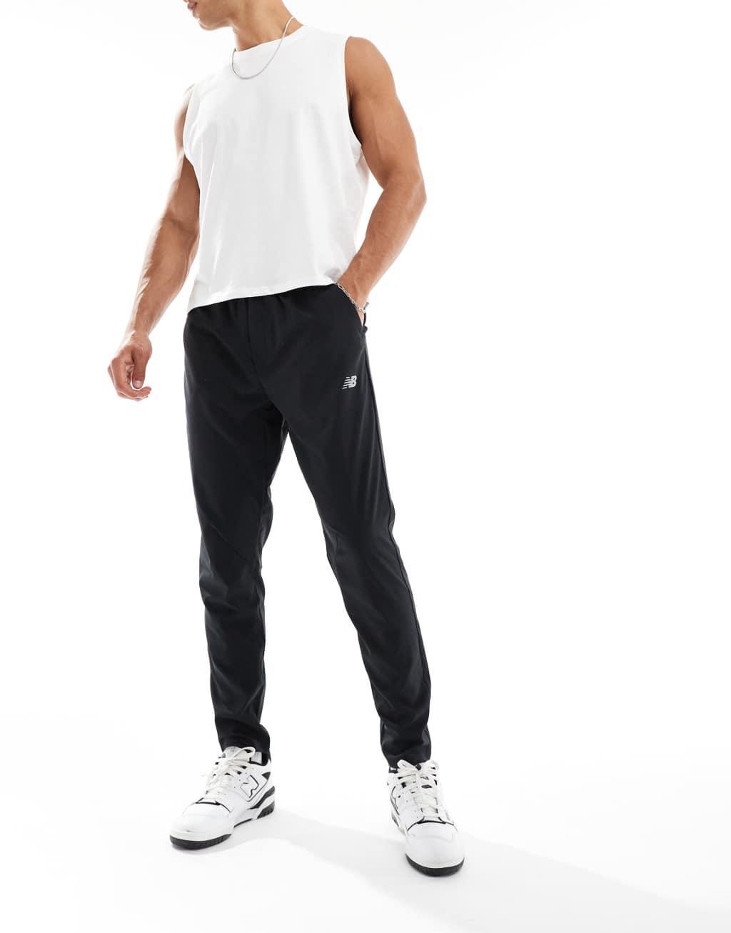 New Balance sport AC tapered track pants in black Product Image