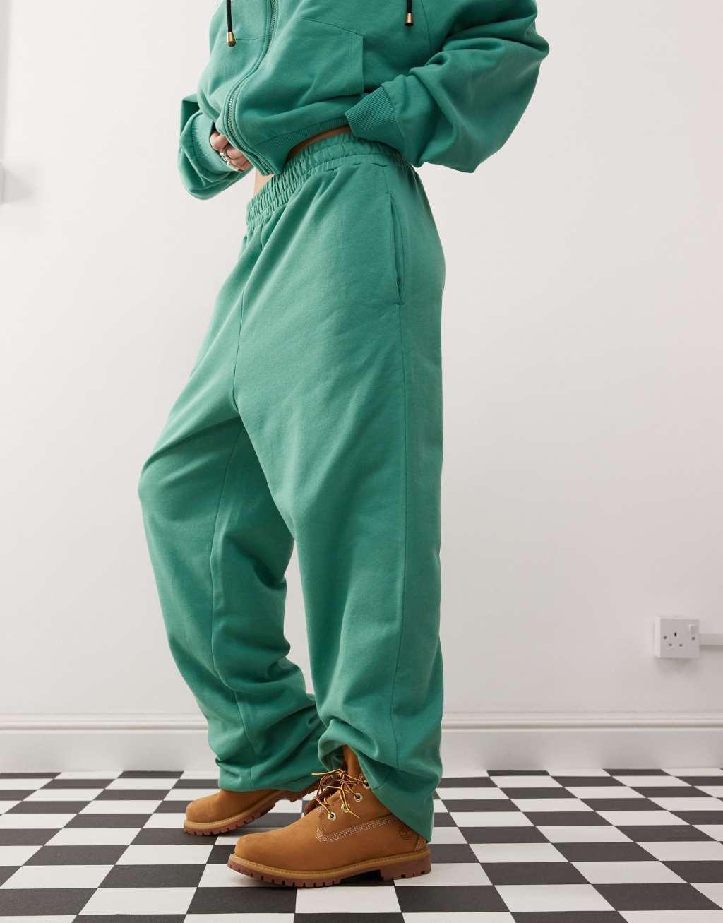 COLLUSION oversized sweatpants with embroidery in green - part of a set Product Image