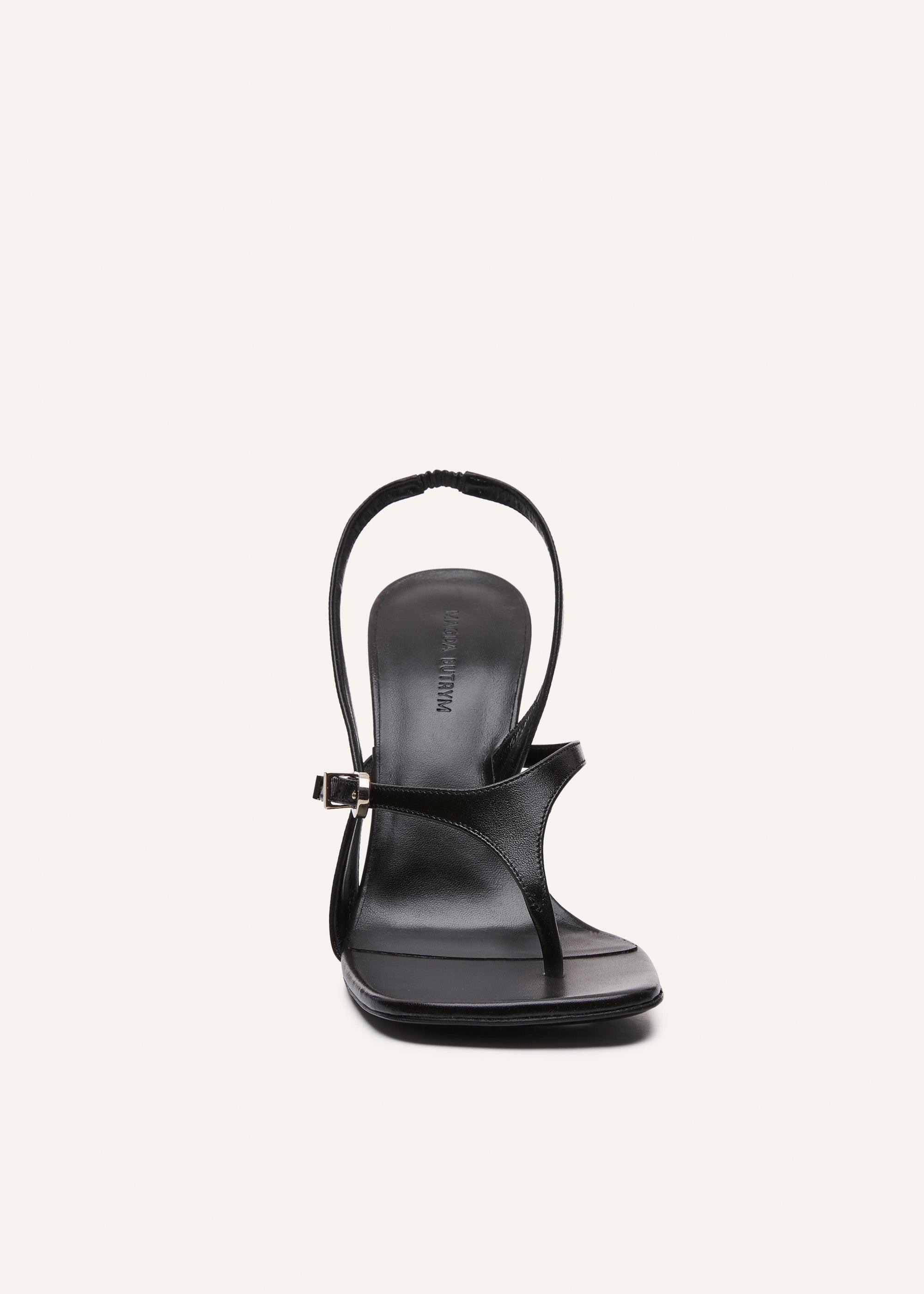 Thong sandals in black leather Product Image