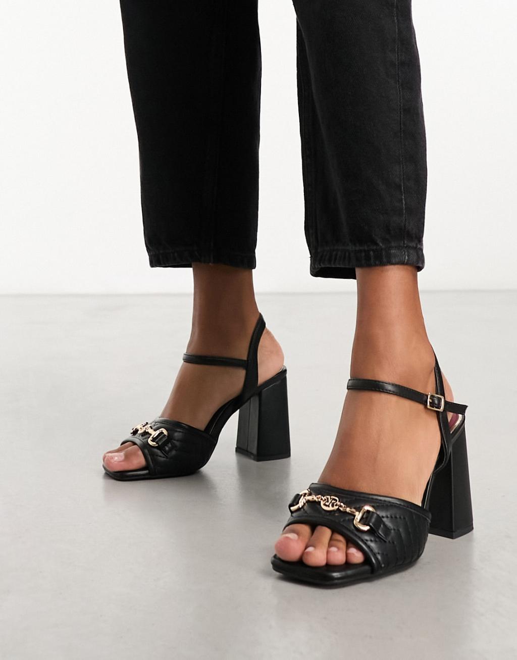 River Island block heel with hold buckle detail in black Product Image