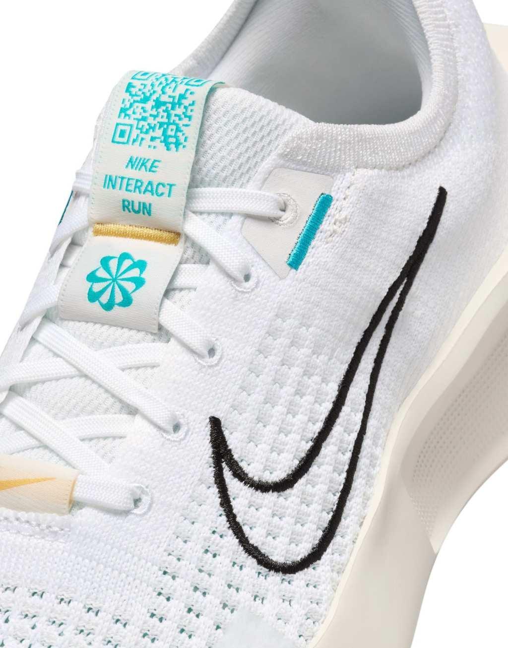 Nike Running Interact sneakers in white Product Image