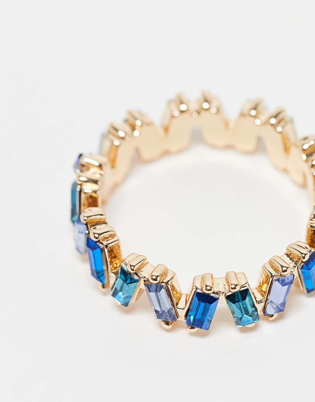 ASOS DESIGN baguette ring with tonal blue stones in gold tone Product Image