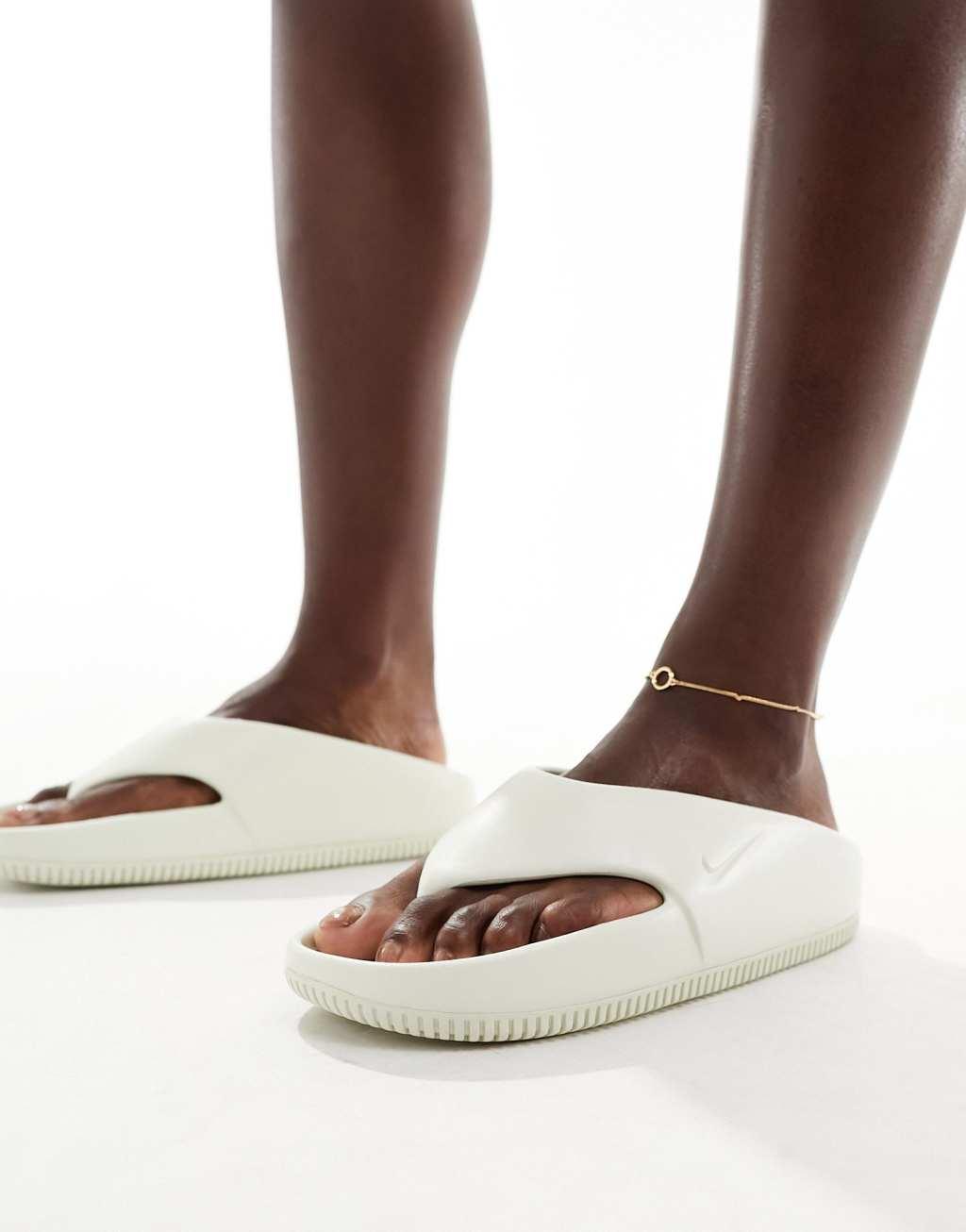 Nike Calm flip flops in off white  Product Image