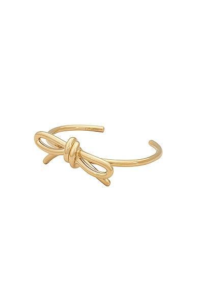 Valentino Garavani Bow Cuff Bracelet in Metallic Gold Product Image