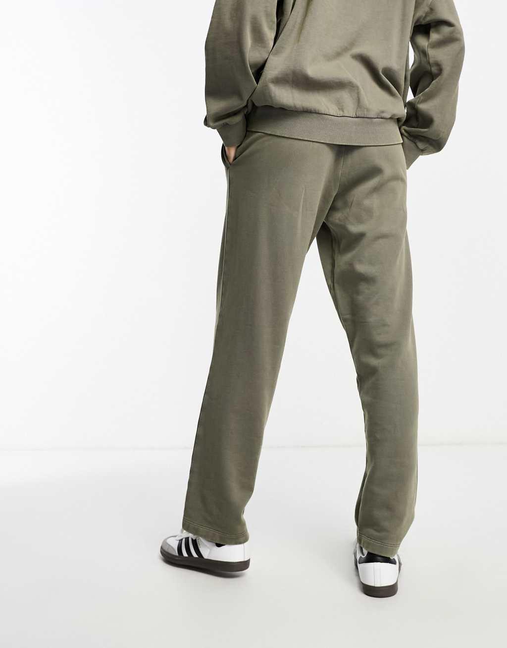 ASOS DESIGN straight leg sweatpants in washed khaki Product Image