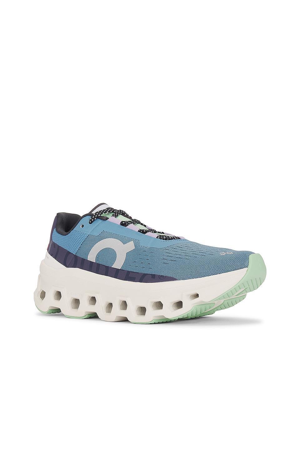 On Cloudmonster Sneaker in Dust & Vapor - Blue. Size 6.5 (also in 5, 9.5). Product Image