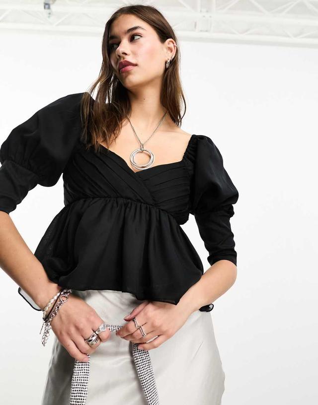 Reclaimed Vintage blouse with puff sleeve and asymmetric hem Product Image