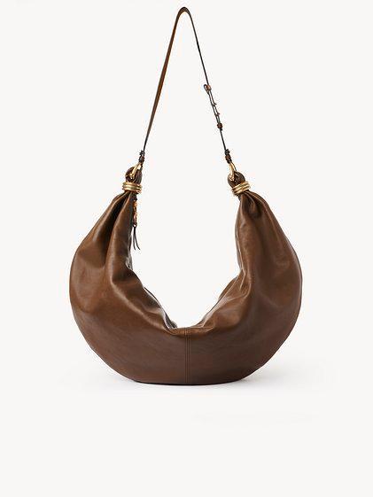 Large Bracelet Hobo bag in grained leather Product Image