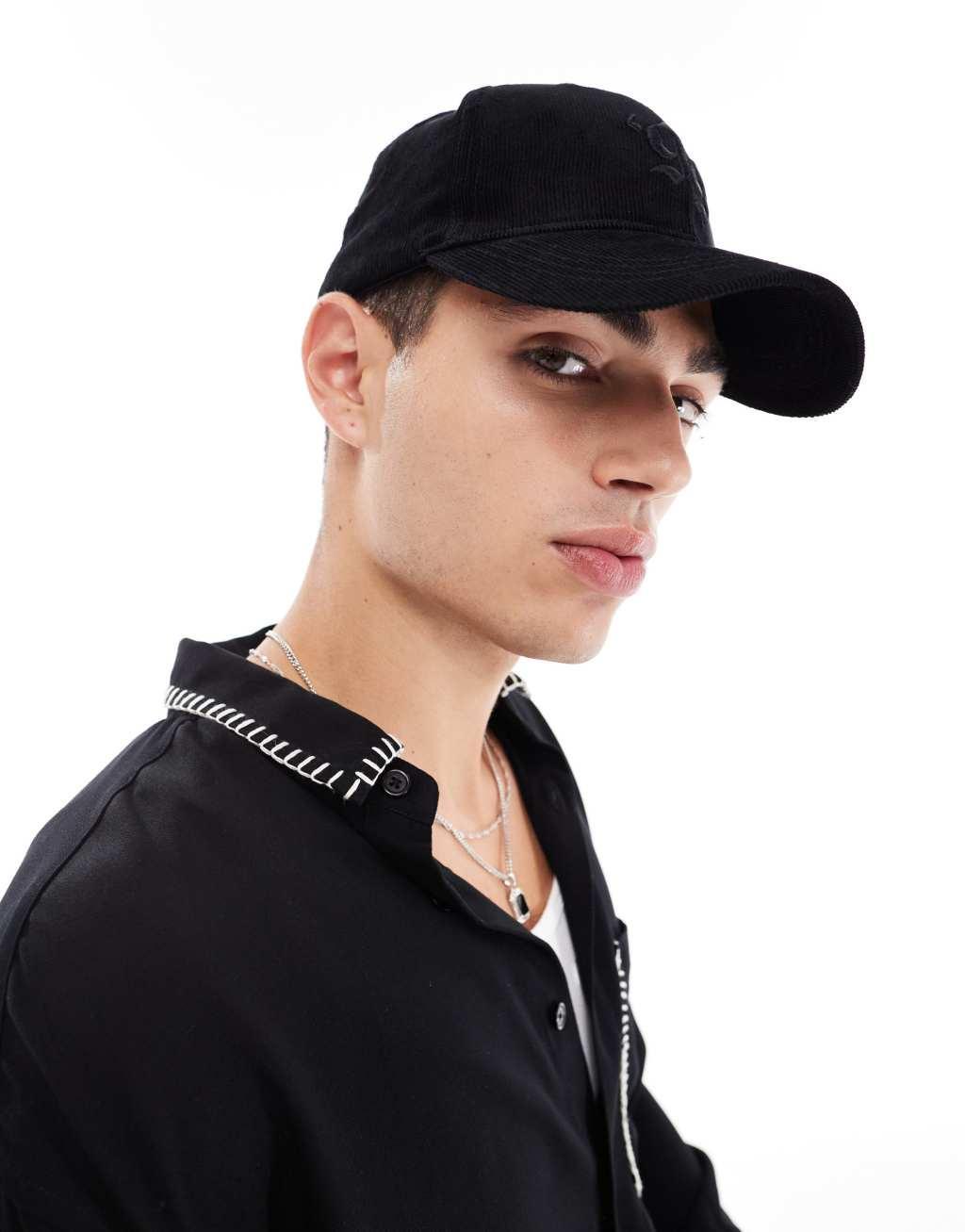 ASOS DESIGN cord baseball cap with graphic in black Product Image