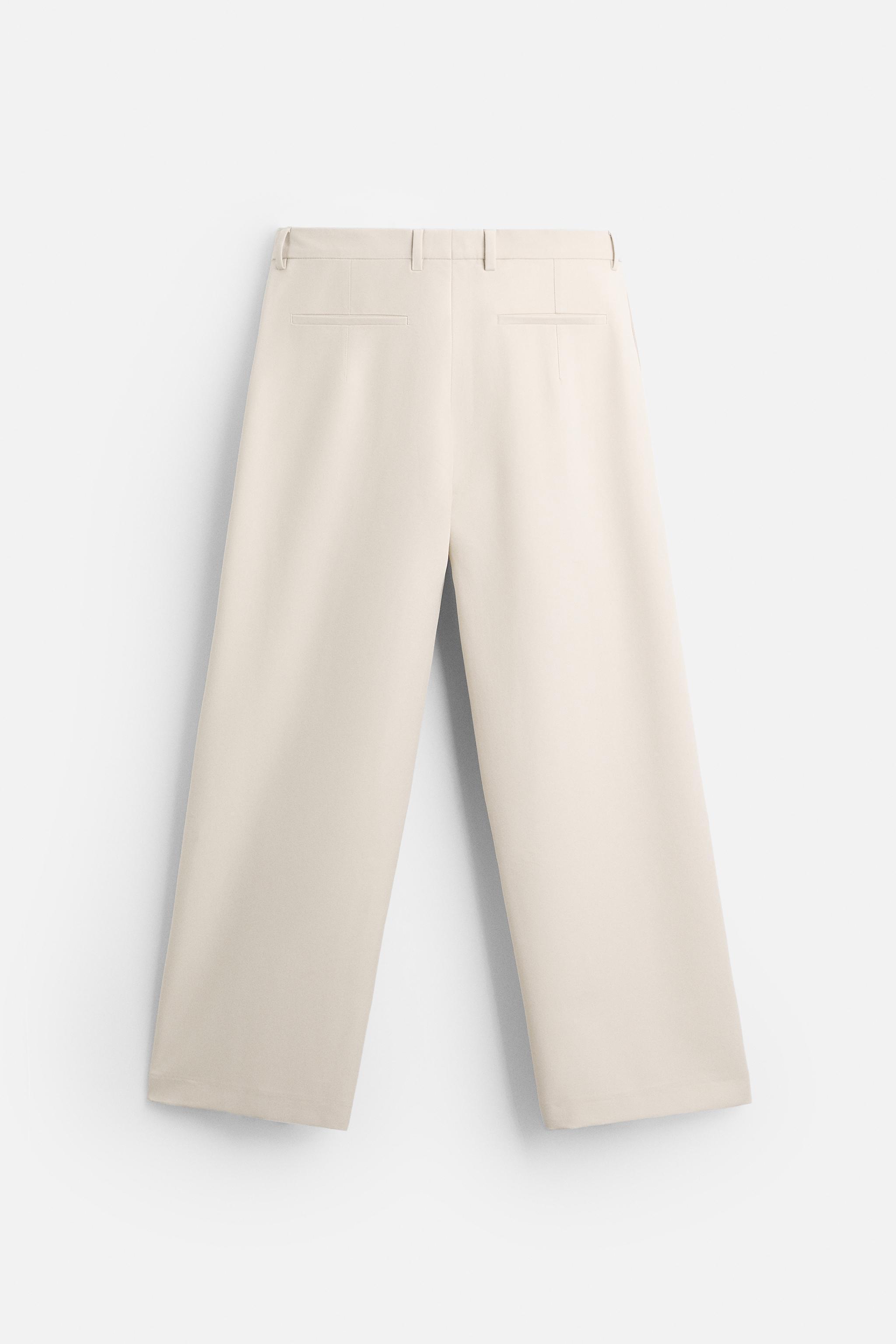 PLEATED WIDE FIT PANTS Product Image