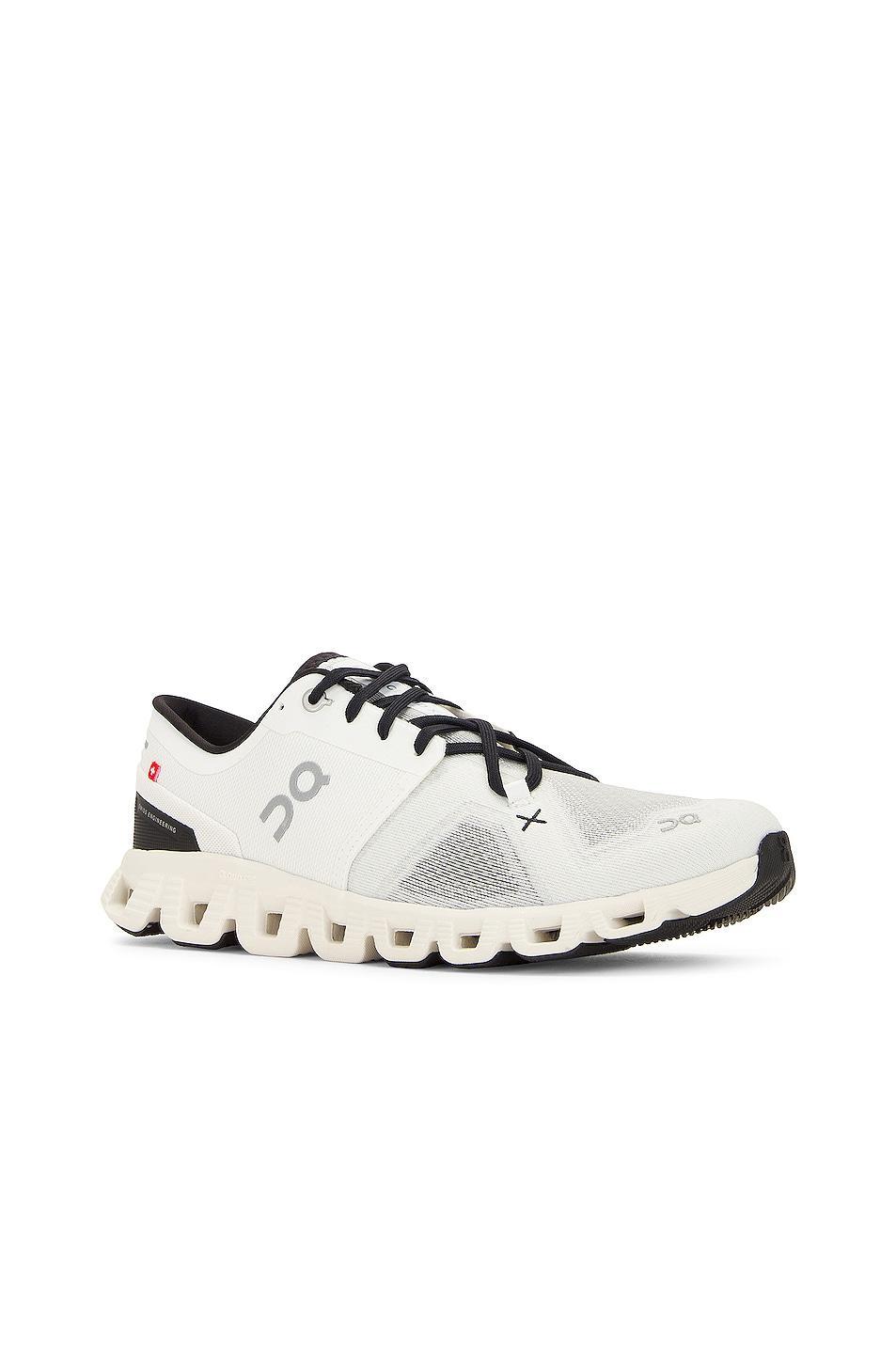 On Cloud X 3 in Ivory & Black - Ivory. Size 11 (also in 10, 10.5, 11.5, 12, 12.5, 13, 7, 7.5, 8). Product Image