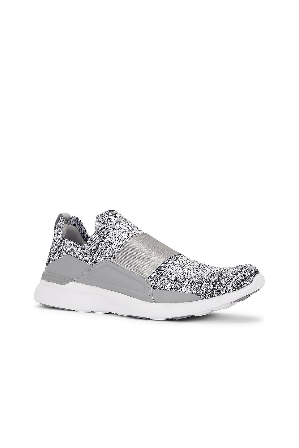 APL: Athletic Propulsion Labs Techloom Bliss Sneaker in Heather Grey & White - Grey. Size 11.5 (also in 10.5, 11, 9). Product Image