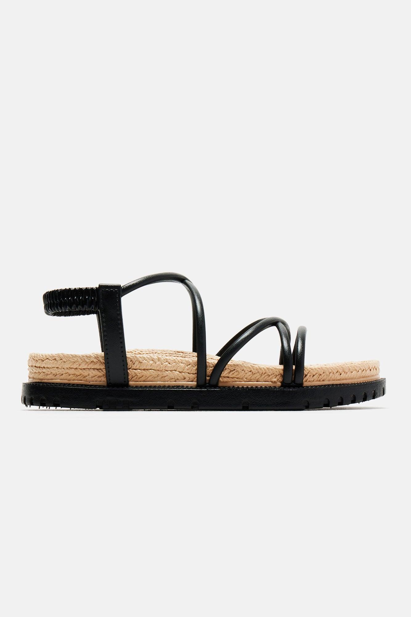 Alaia Flat Sandals - Black Product Image