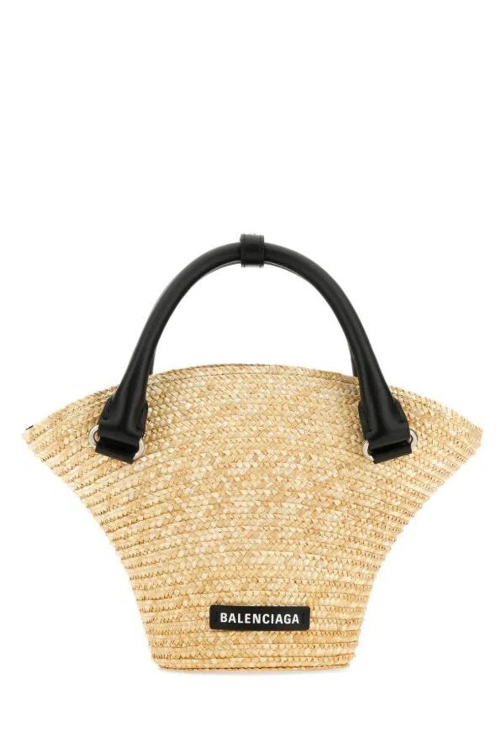 BALENCIAGA Medium Braided-raffia Tote Bag In Natural Product Image