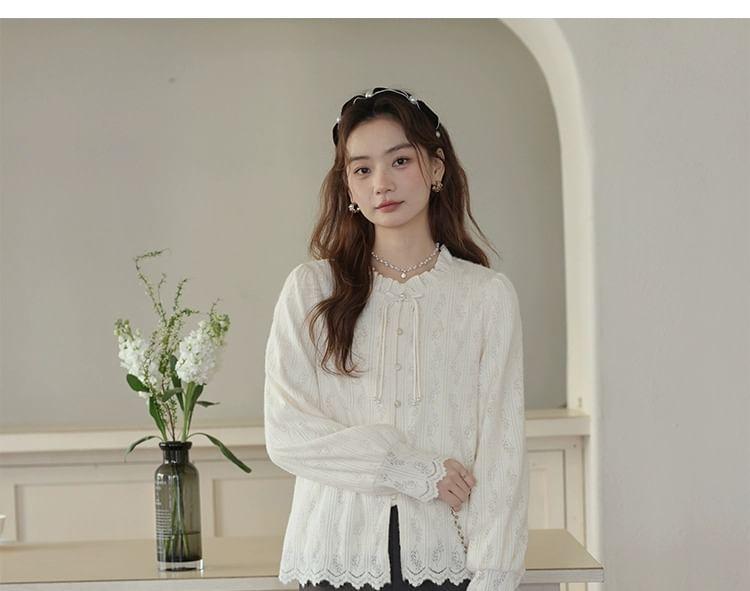 Long-Sleeve Round Neck Frill Trim Frog Button Blouse Product Image