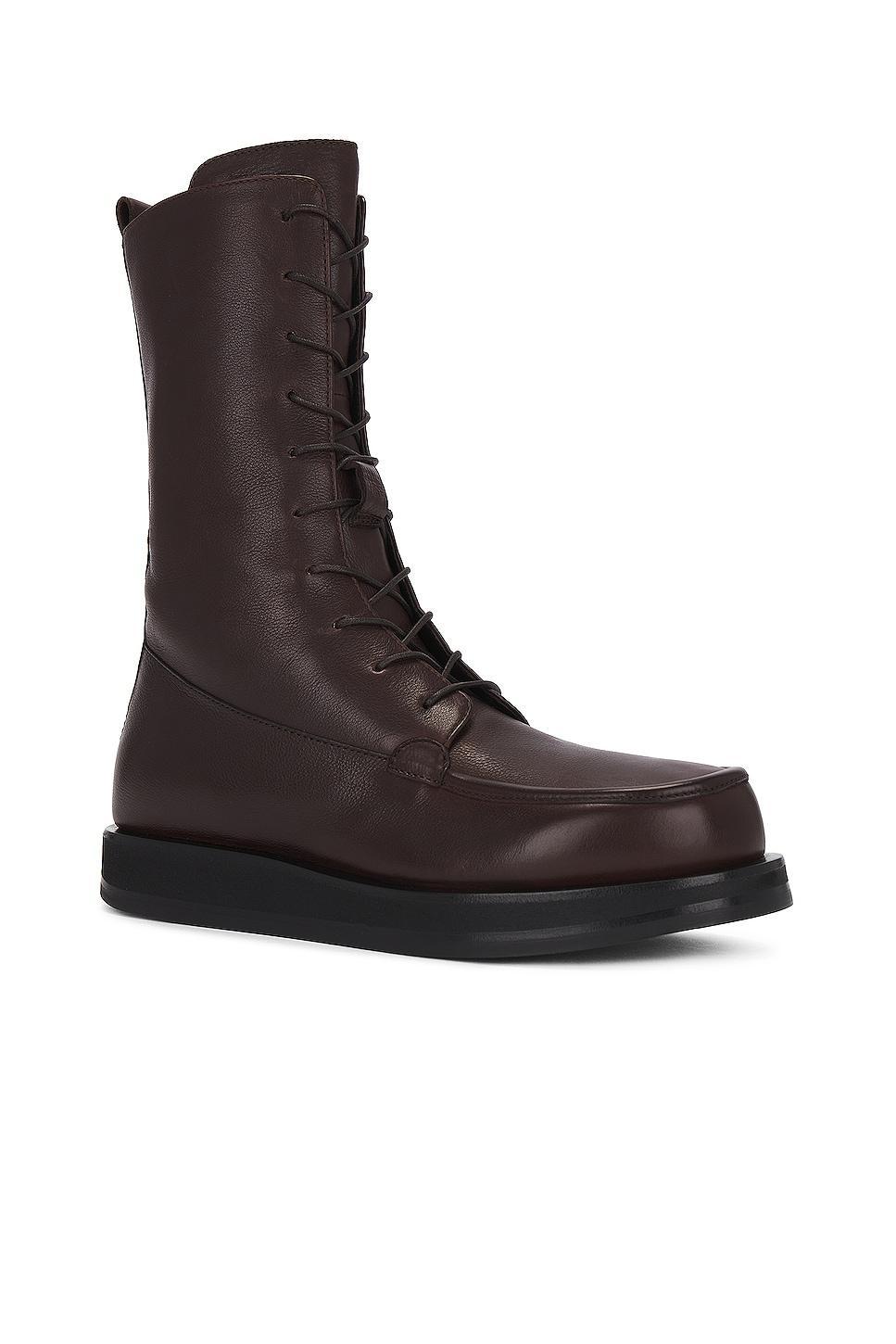 The Row Patty Boot in Dark Brown - Brown. Size 36.5 (also in 37.5, 38, 39, 41). Product Image