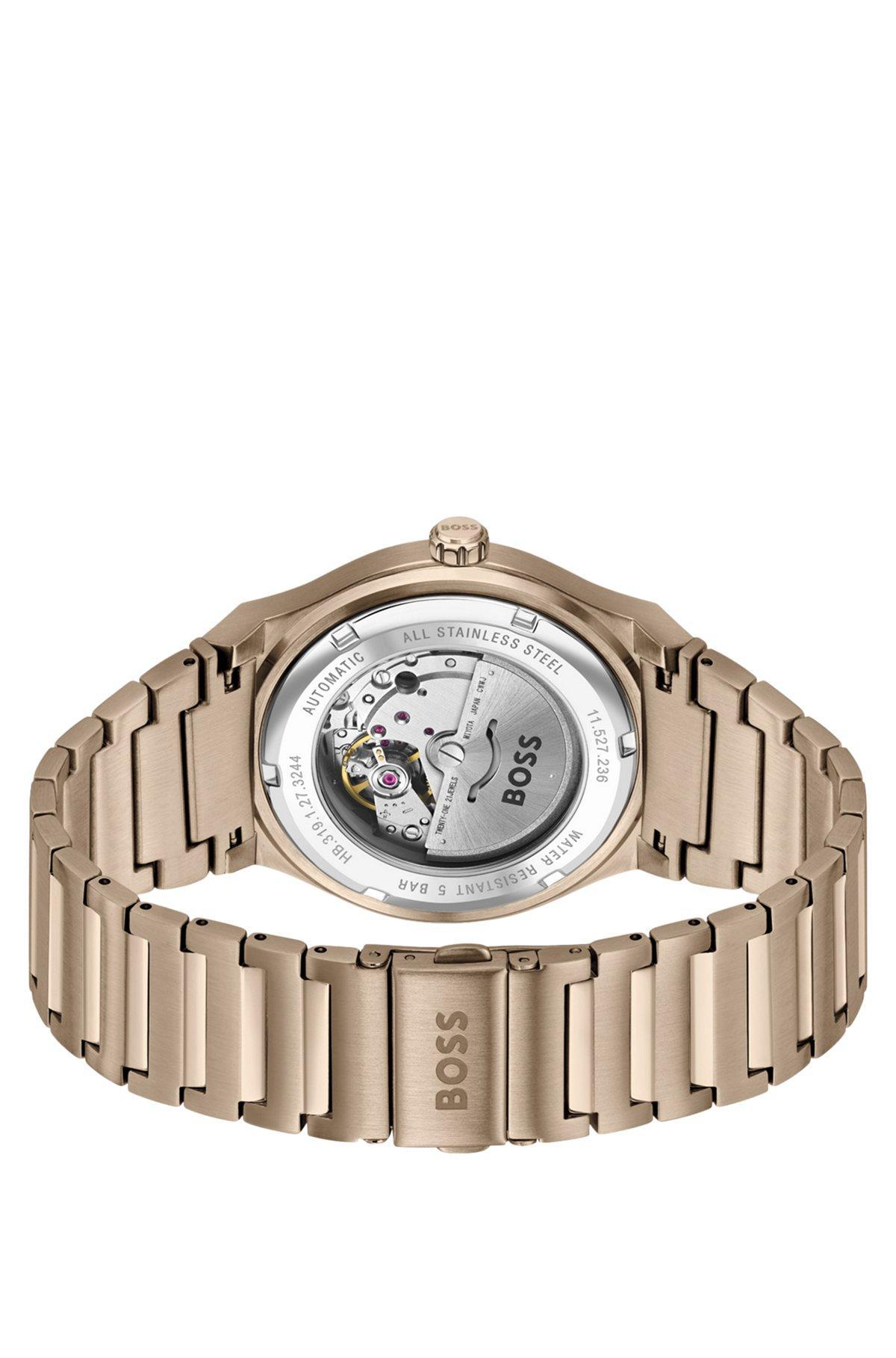 Gold-tone automatic watch with grooved dial Product Image