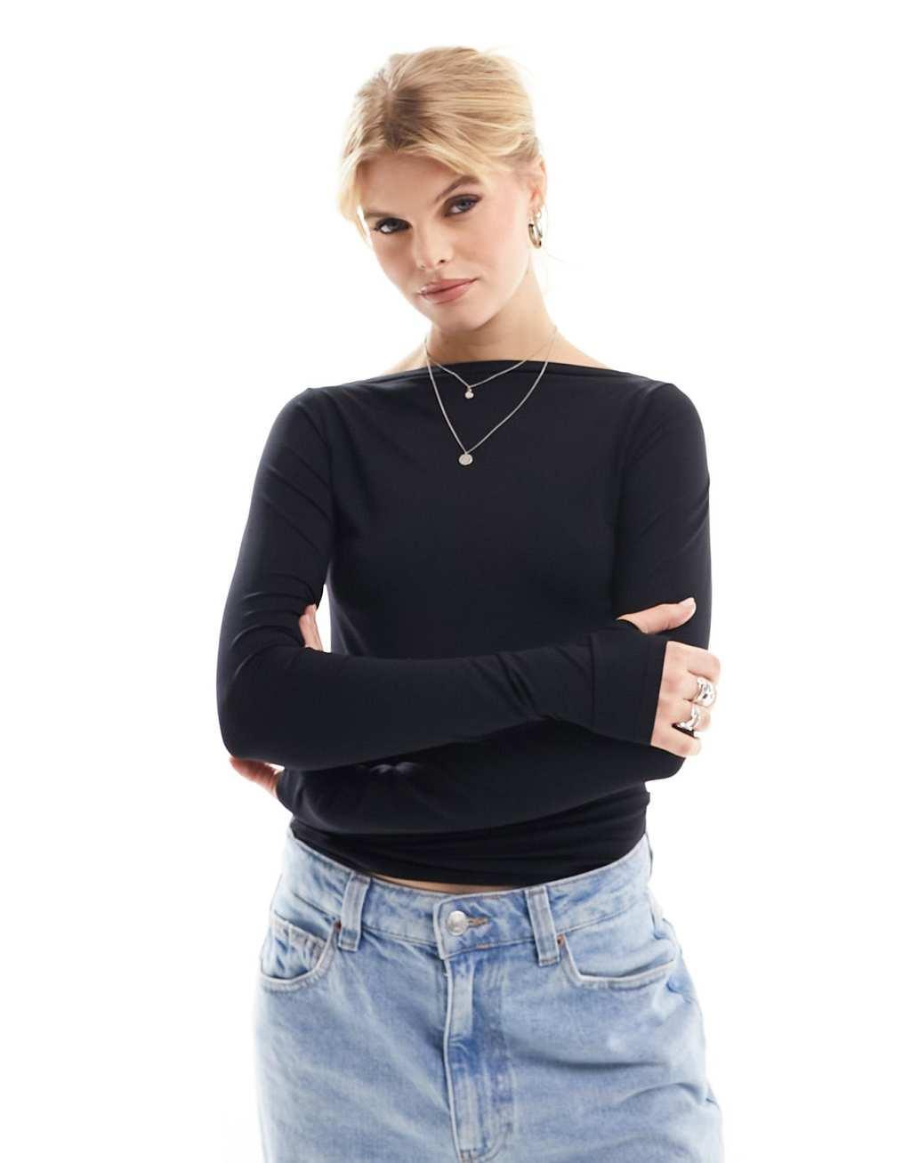 Weekday open back seamless long sleeve top in black Product Image