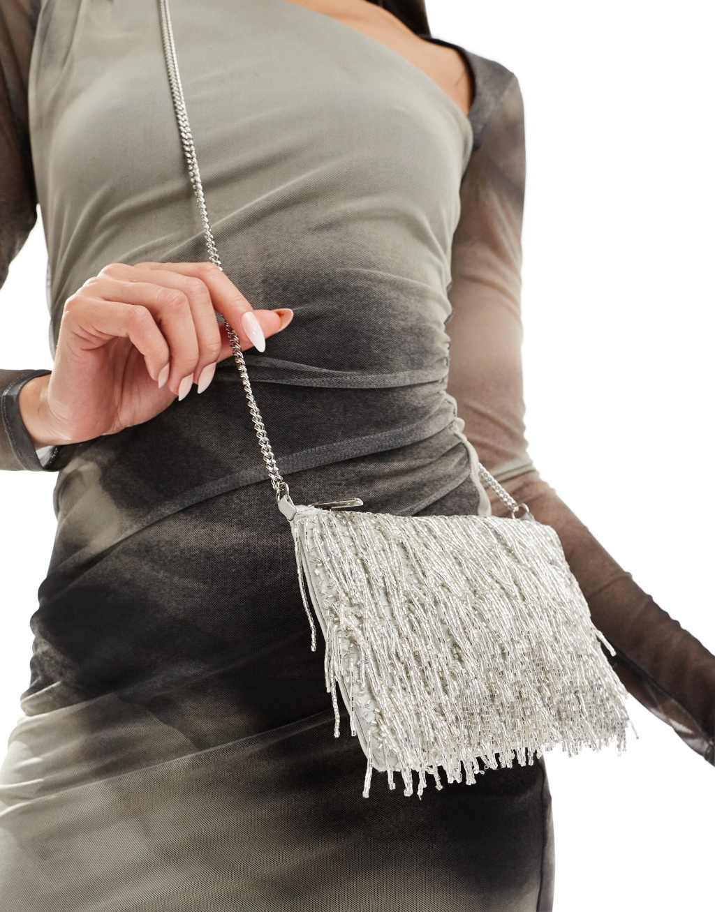 True Decadence embellished tassel clutch bag in silver Product Image