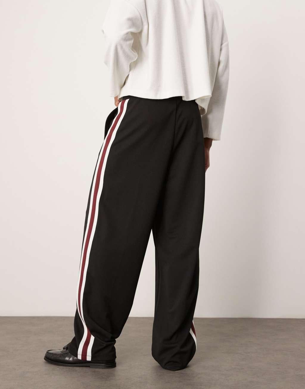 ASOS DESIGN super baggy sweatpants with pintucks and side panels in black Product Image