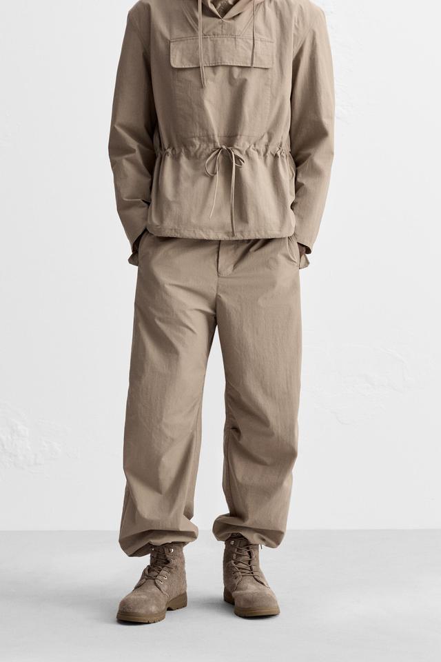 TECHNICAL WATER REPELLENT PARACHUTE PANTS Product Image