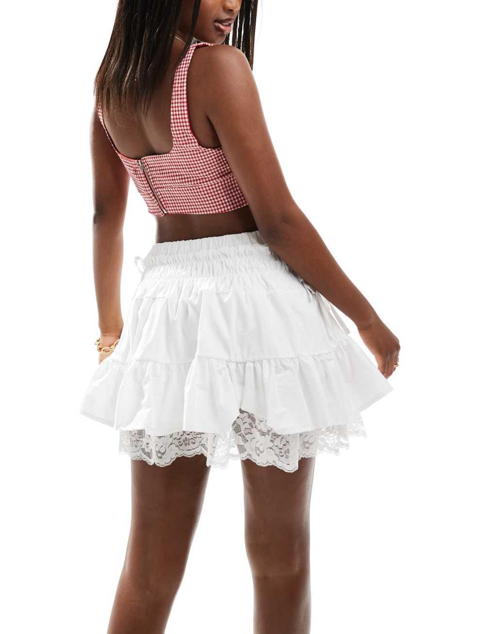 Reclaimed Vintage western cowgirl mini skirt with lace hem in white Product Image