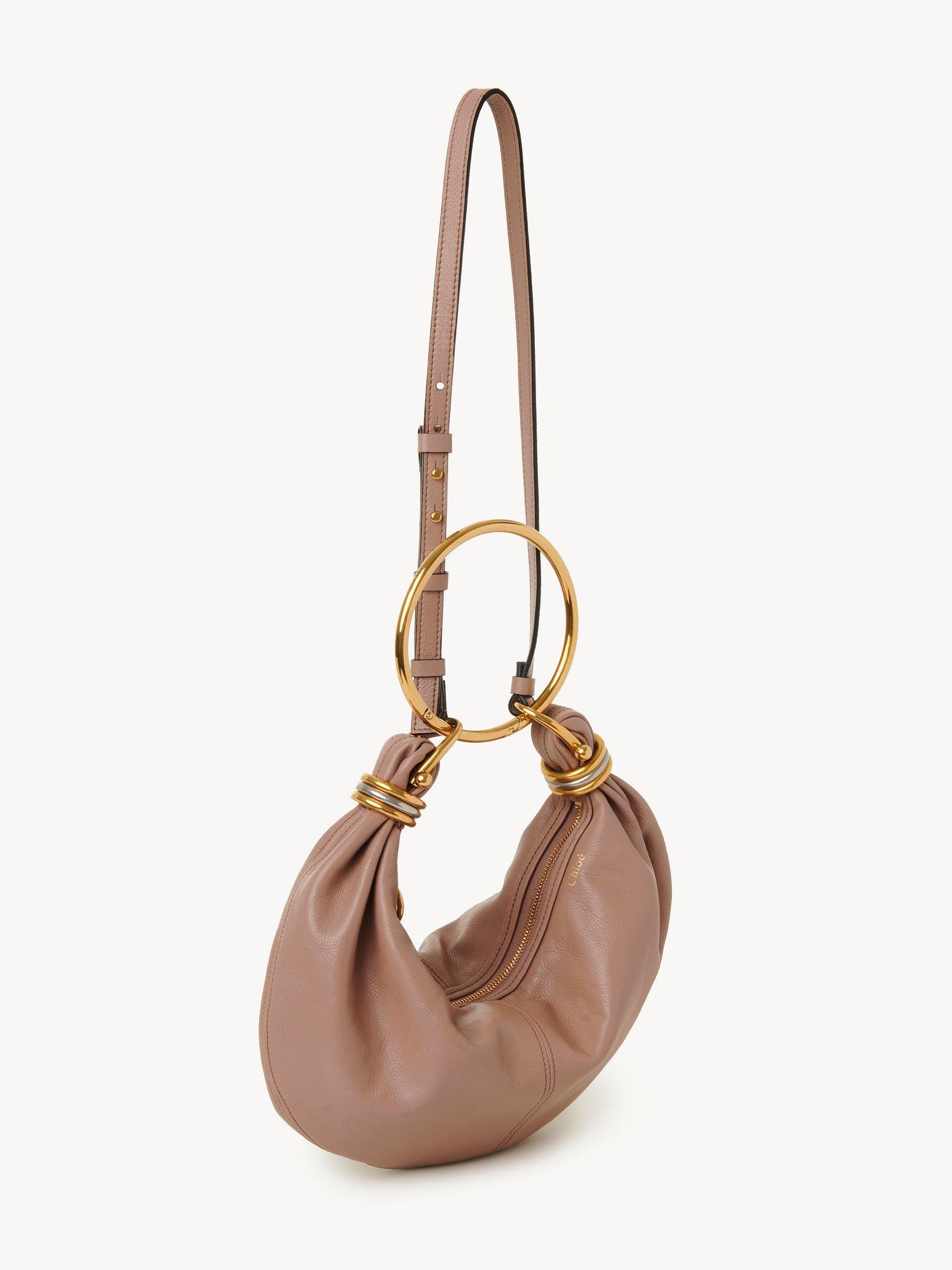 Small Bracelet Hobo bag in grained leather Product Image