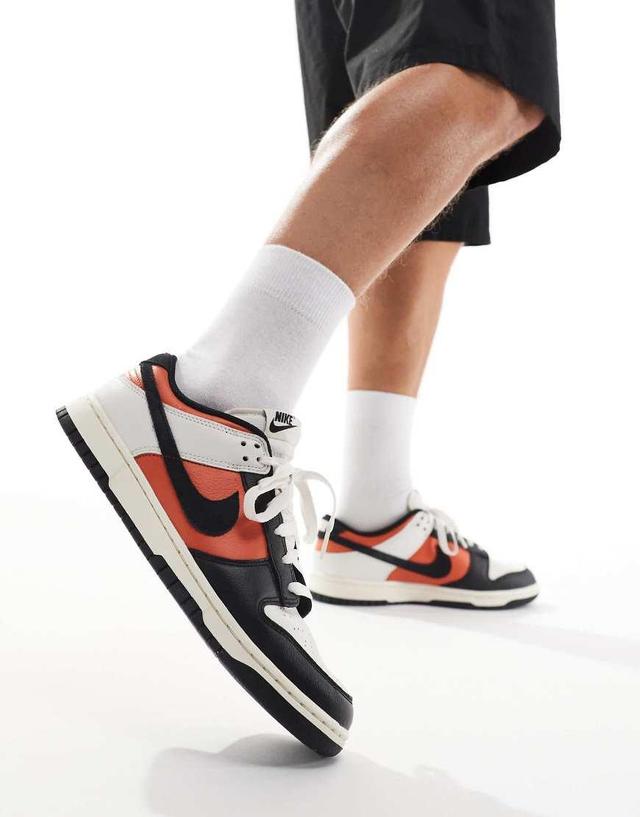 NIKE Dunk Low Retro Vintage Coral Sneakers In Black, White And Orange Product Image