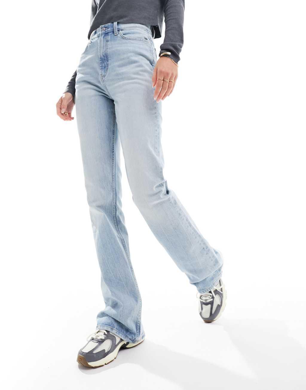 ASOS DESIGN Tall mid rise flare jeans in light blue Product Image