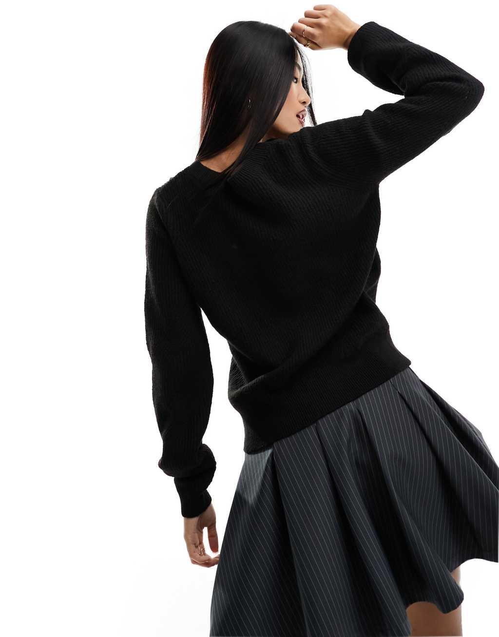 JDY reversible sweater with lace trim in black Product Image