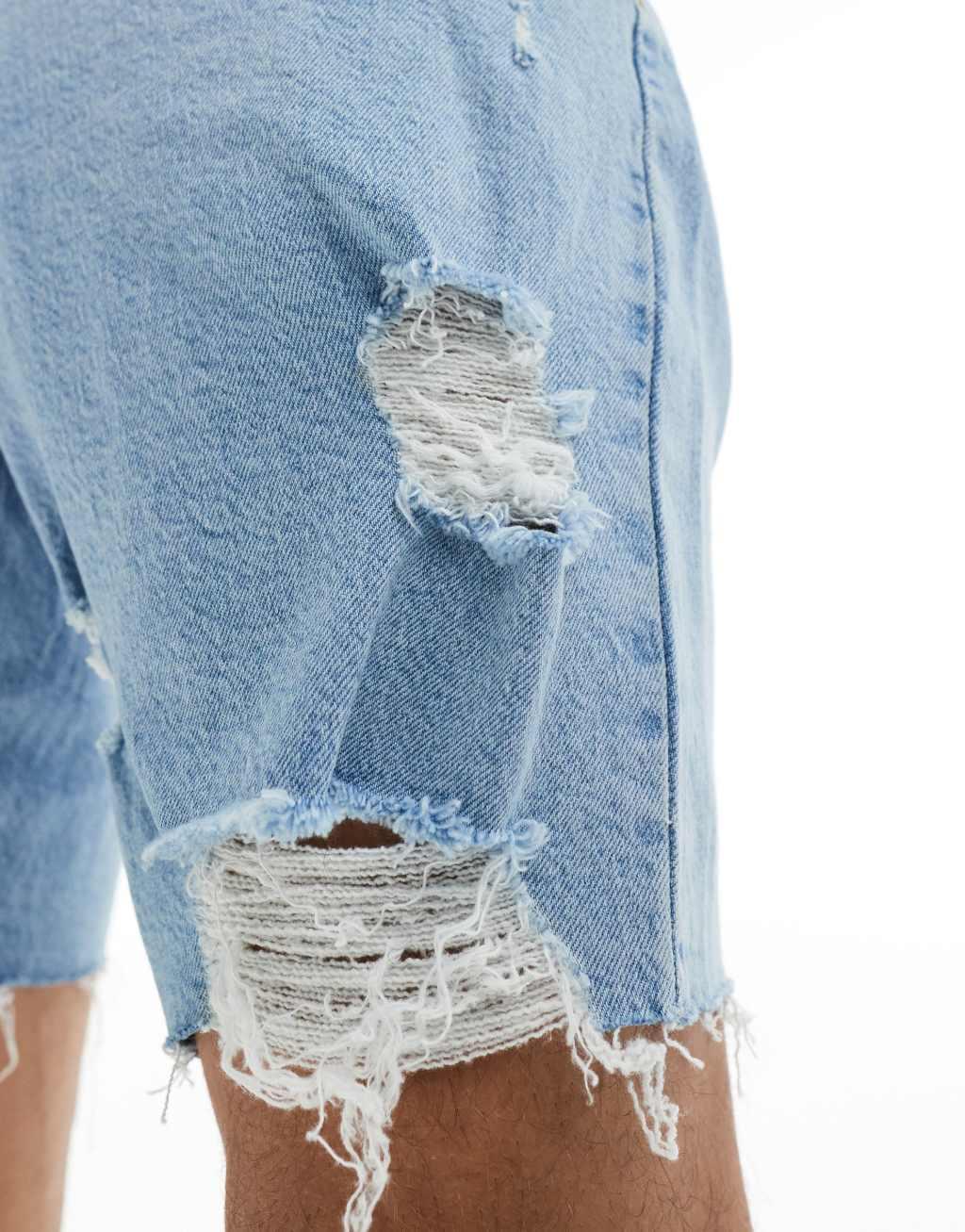 ASOS DESIGN long length denim shorts with abrasions in light wash blue Product Image