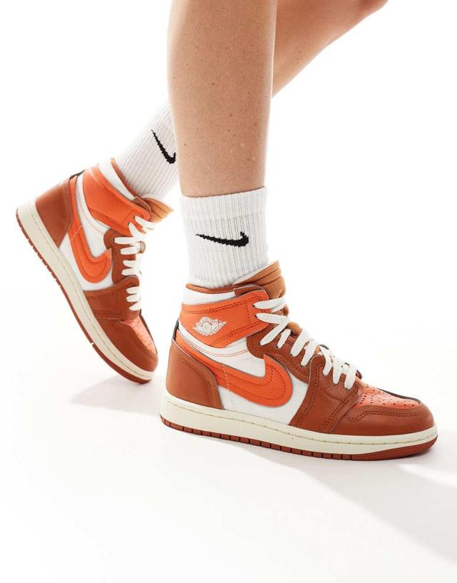 Nike Air Jordan 1 high sneakers in white and orange  Product Image