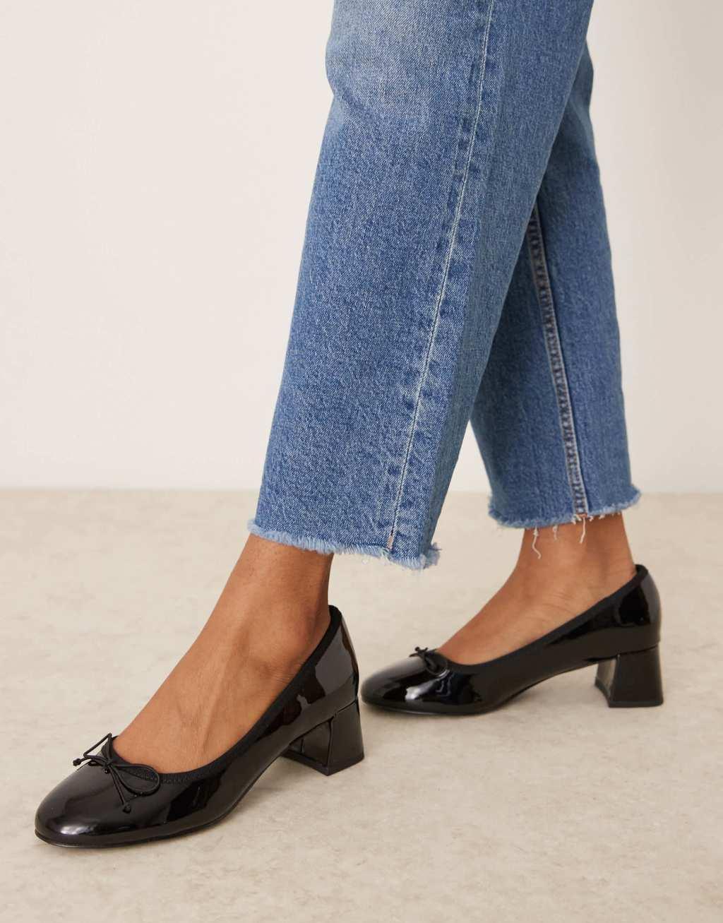 ASOS DESIGN Wide Fit Shelley bow detail mid block heel shoes in black Product Image