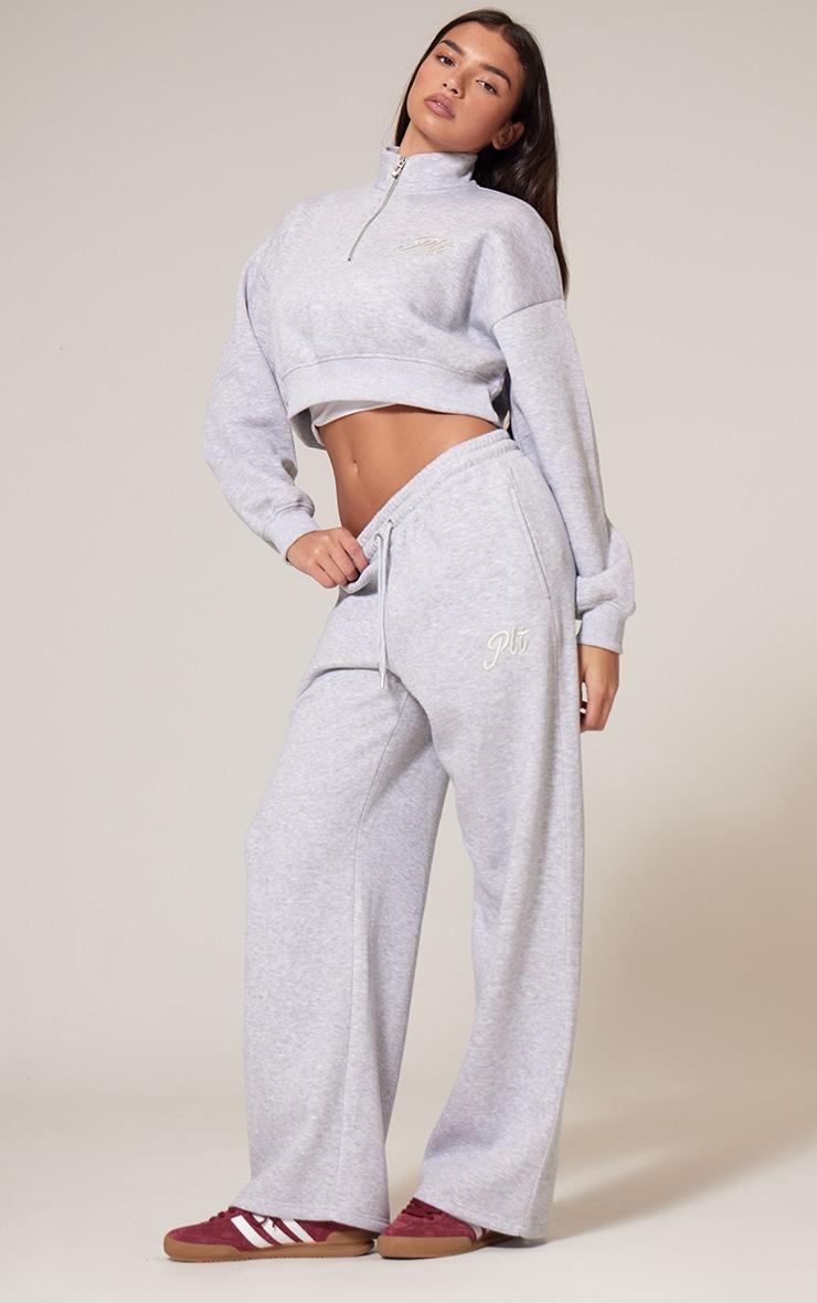 PRETTYLITTLETHING Grey Marl Tonal Embroidered Cropped Half Zip Sweatshirt Product Image