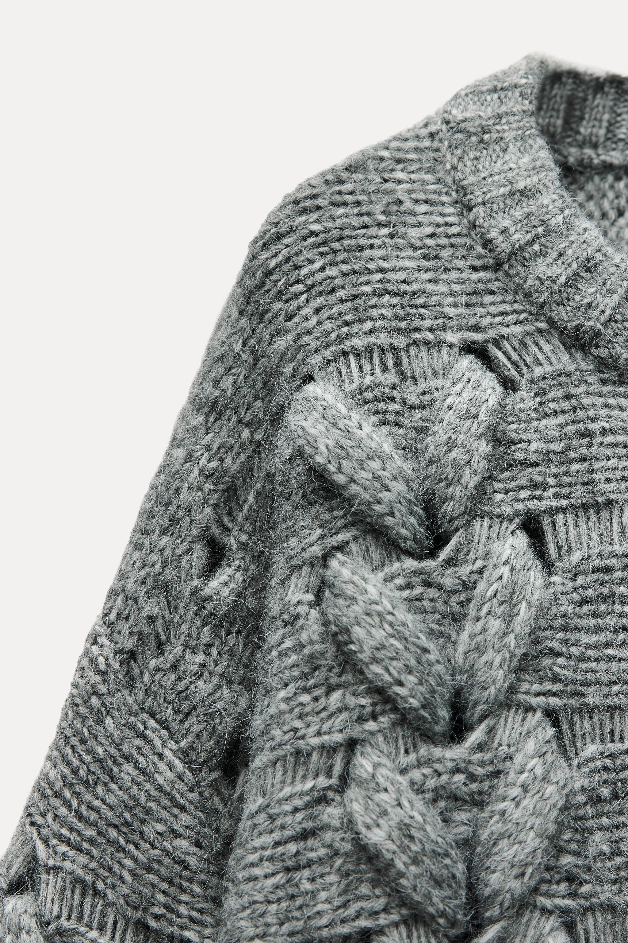 CABLE KNIT SWEATER Product Image