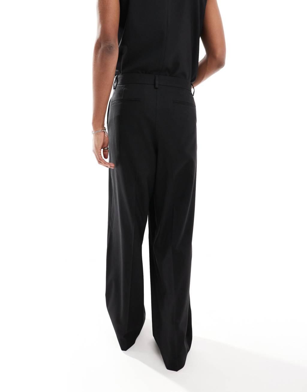 ASOS DESIGN loose leg suit pants in black Product Image