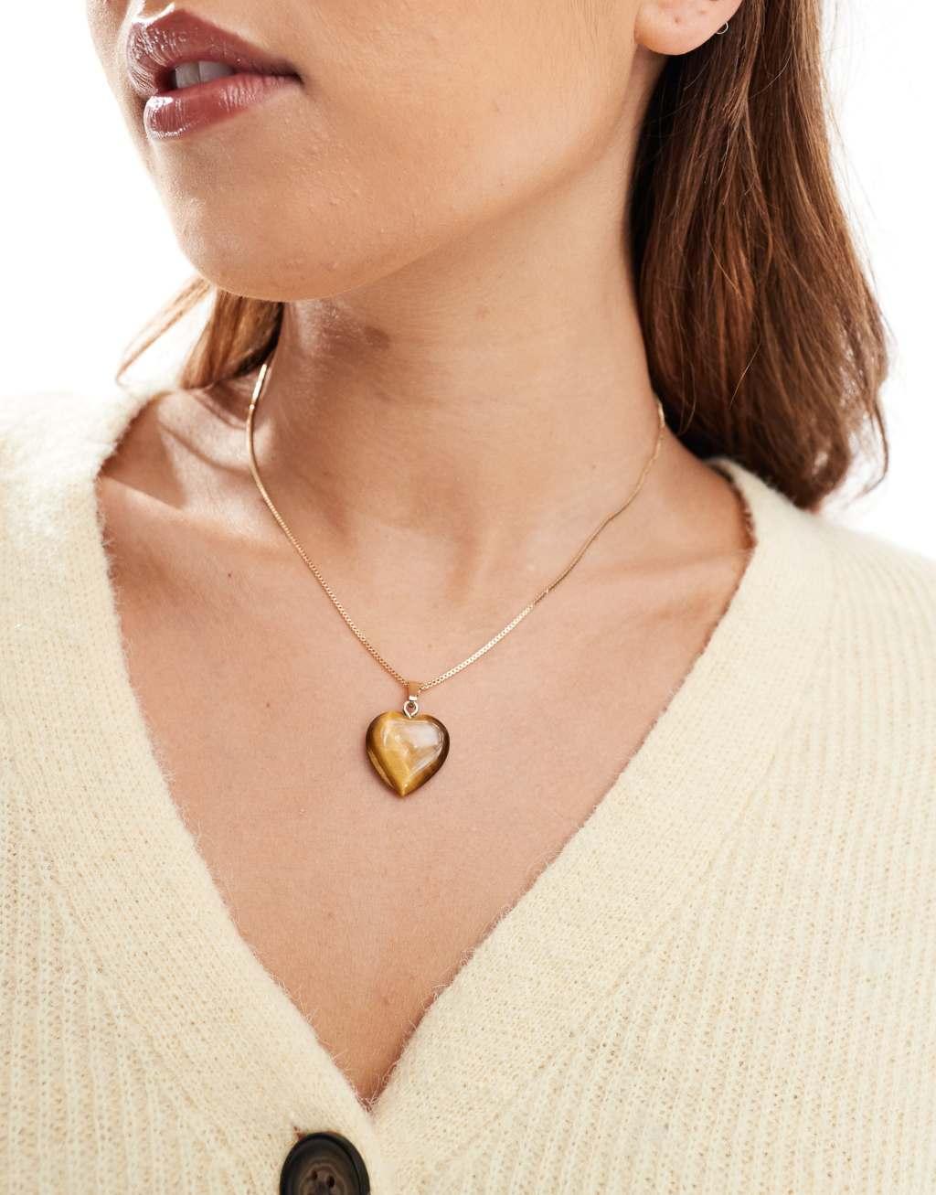 ASOS DESIGN necklace with tiger eye style heart pendant in gold tone Product Image