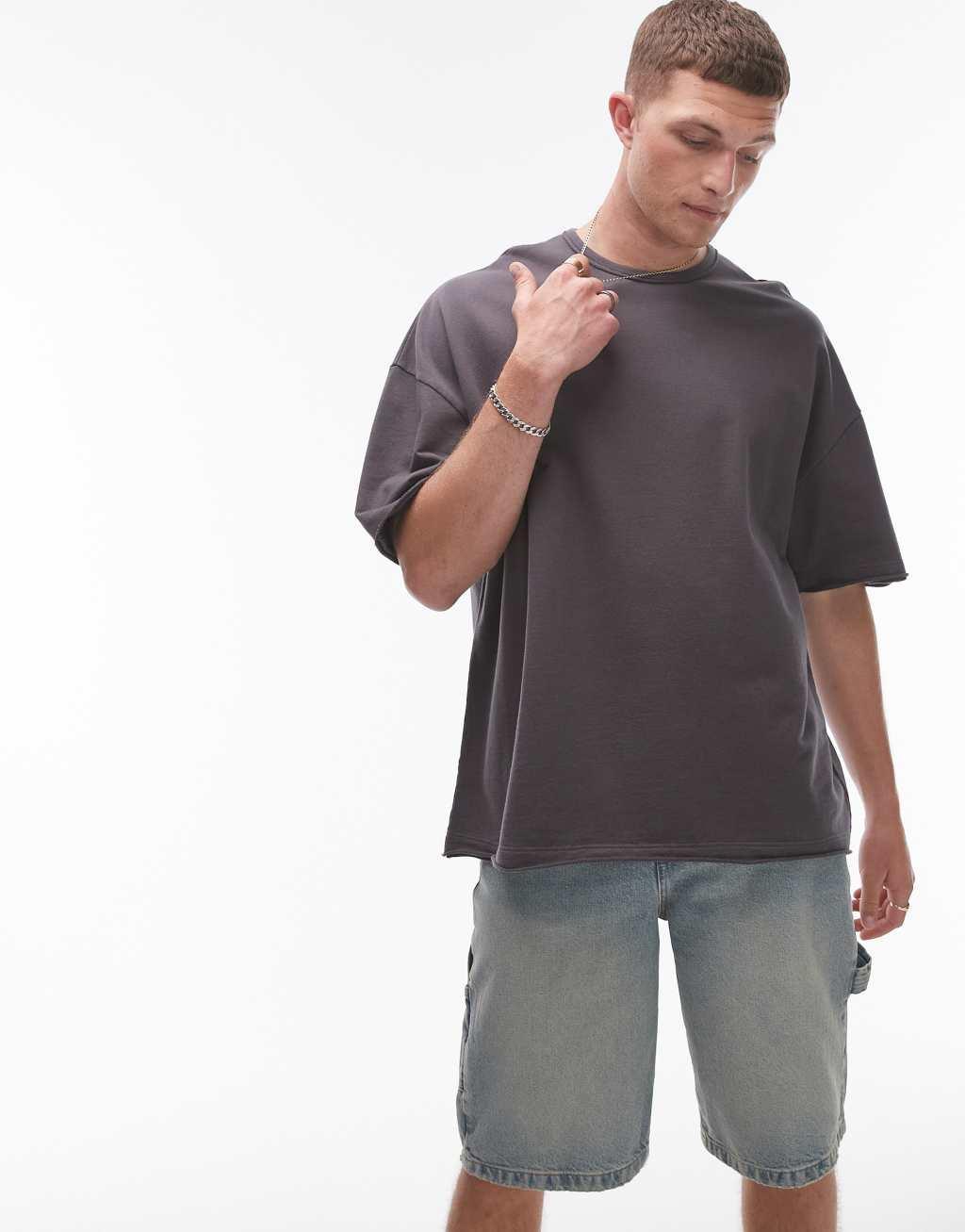 Topman extreme oversized fit washed T-shirt with raw sleeve and hem in washed black Product Image