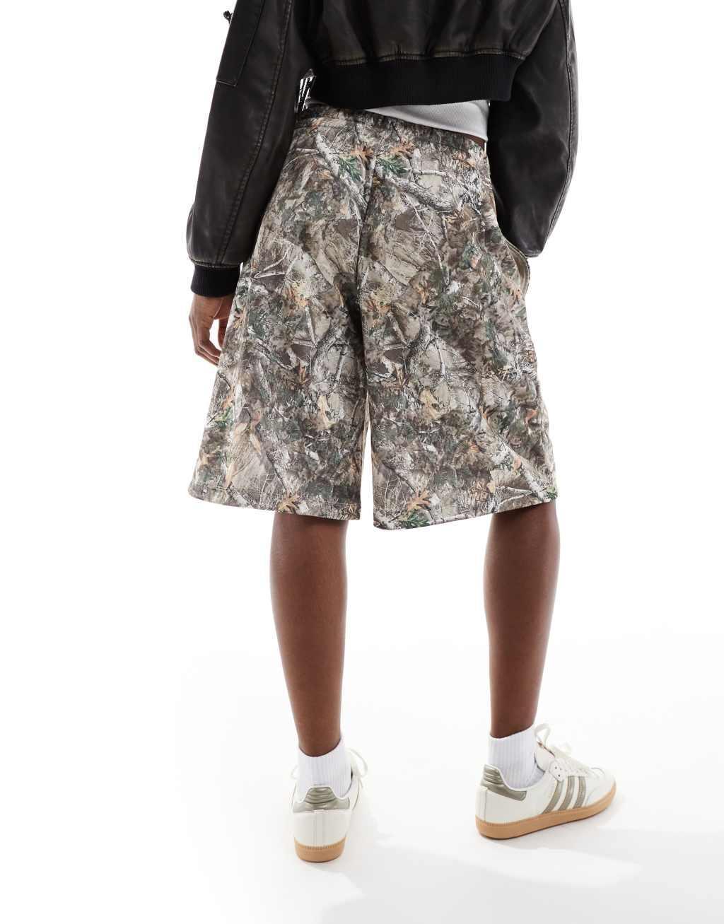 COLLUSION relaxed long sweat shorts in woodland camo Product Image