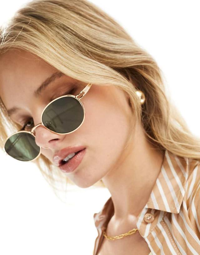 ASOS DESIGN metal oval sunglasses in gold  Product Image