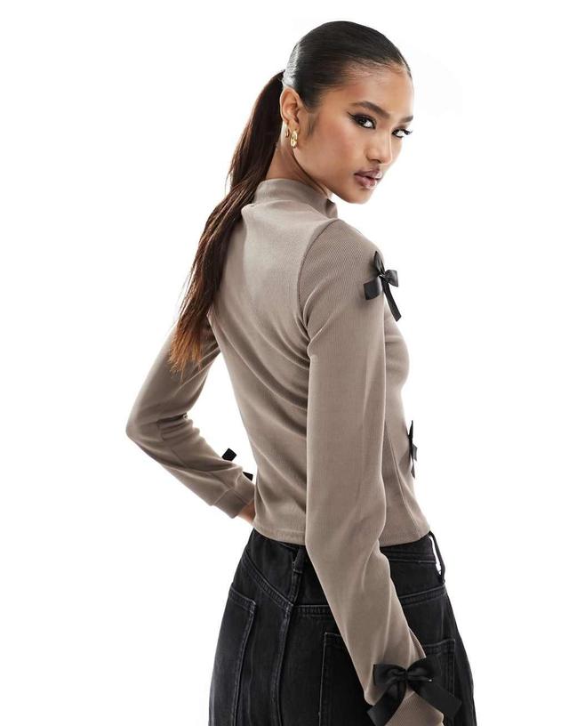 Fashionkilla ribbed zip through contrast bow detail sweater in mocha Product Image