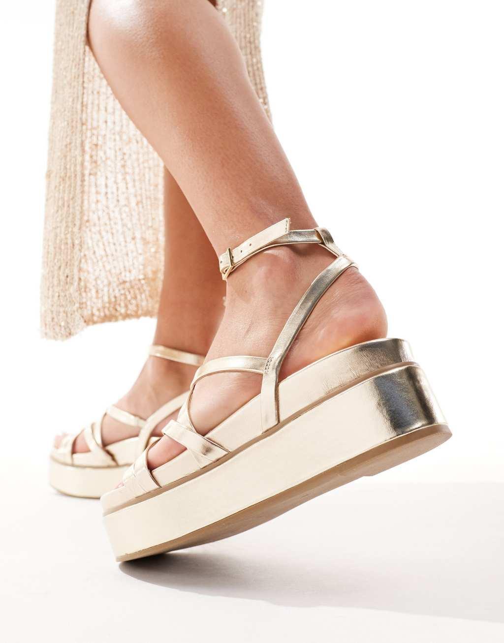 ASOS DESIGN Taurus 2 strappy flatform sandals in gold Product Image