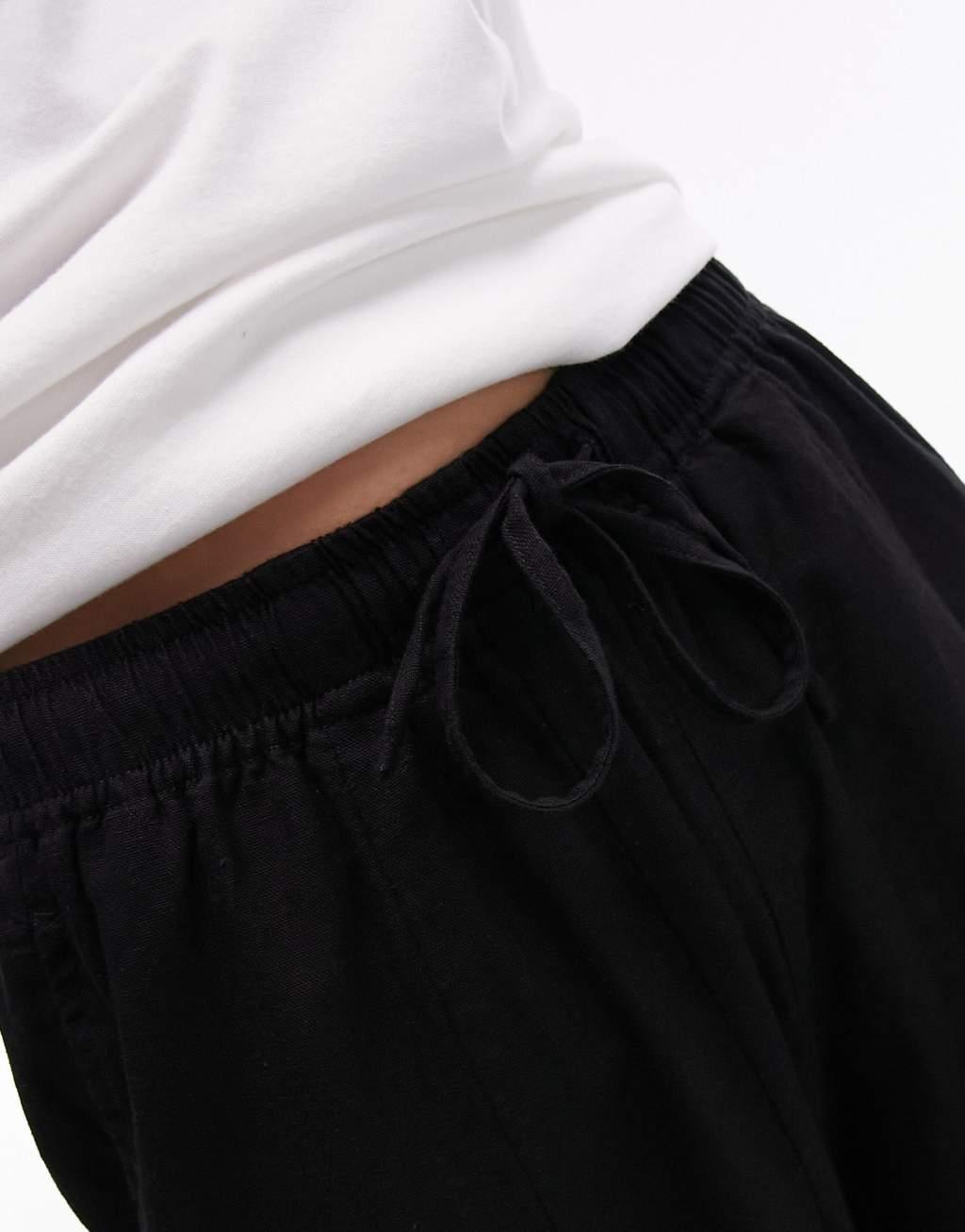 Topshop linen blend balloon pants in black Product Image