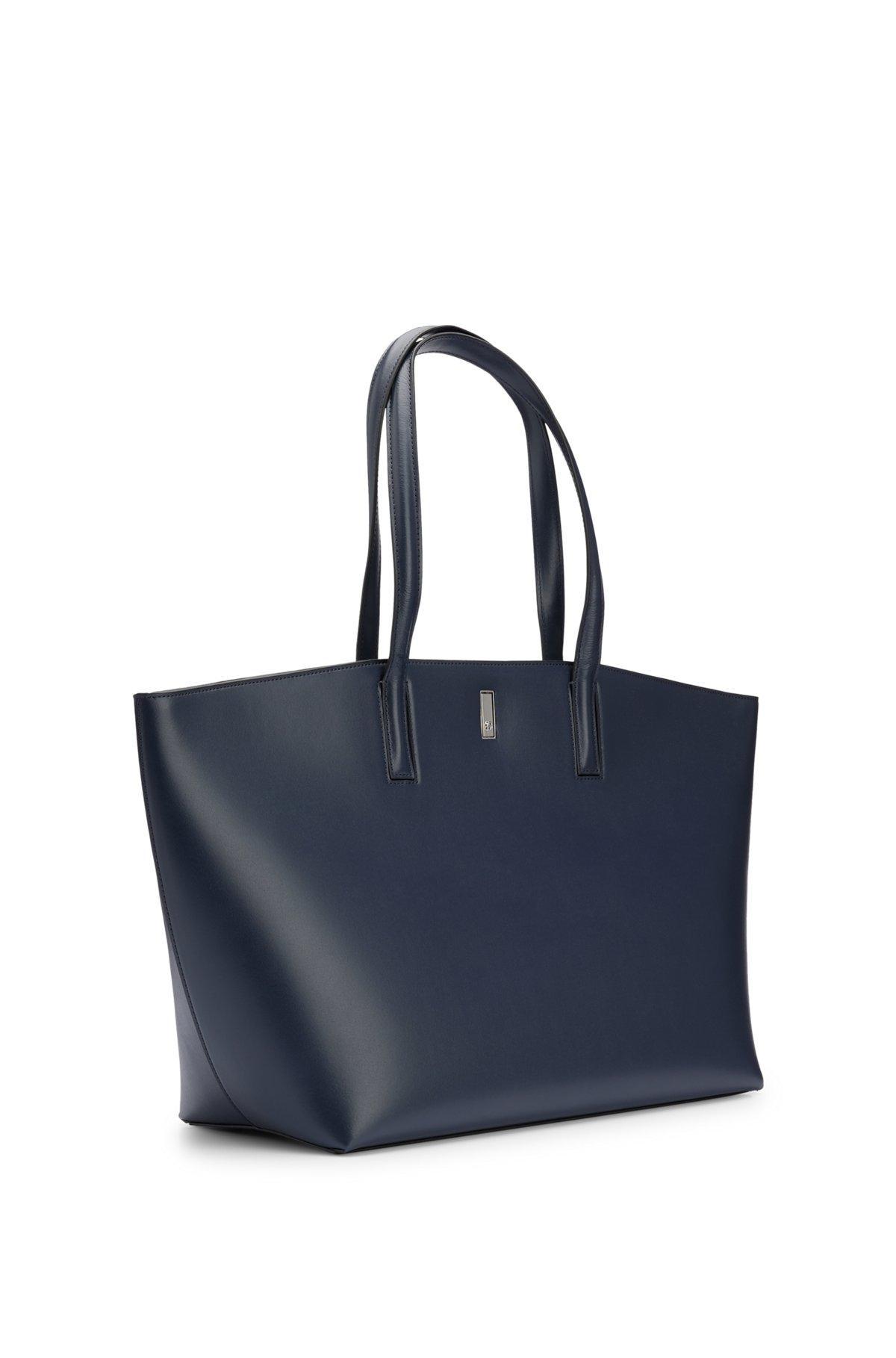 Leather shopper bag with signature hardware Product Image